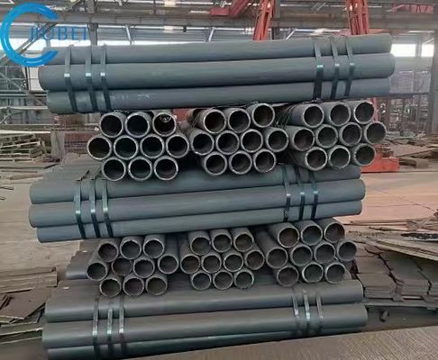 Q235 الأنابيب المعدنية المغطاة بمادة سبيكة مقاومة للارتداء الطول 1m - 12m حسب الطلب